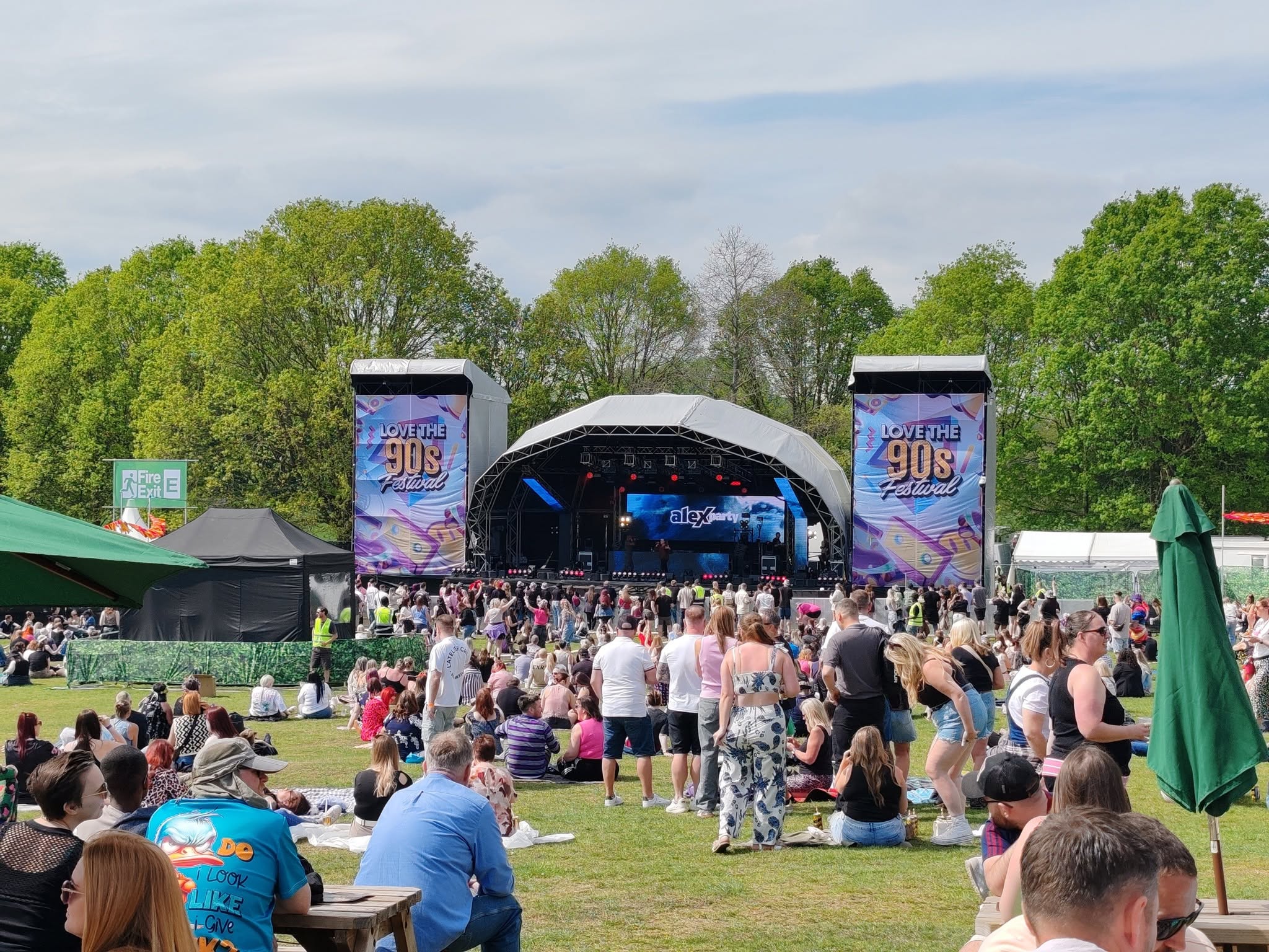 A large summer music festival crowd in front of the main stage, where BelvoirCare provided medical cover.